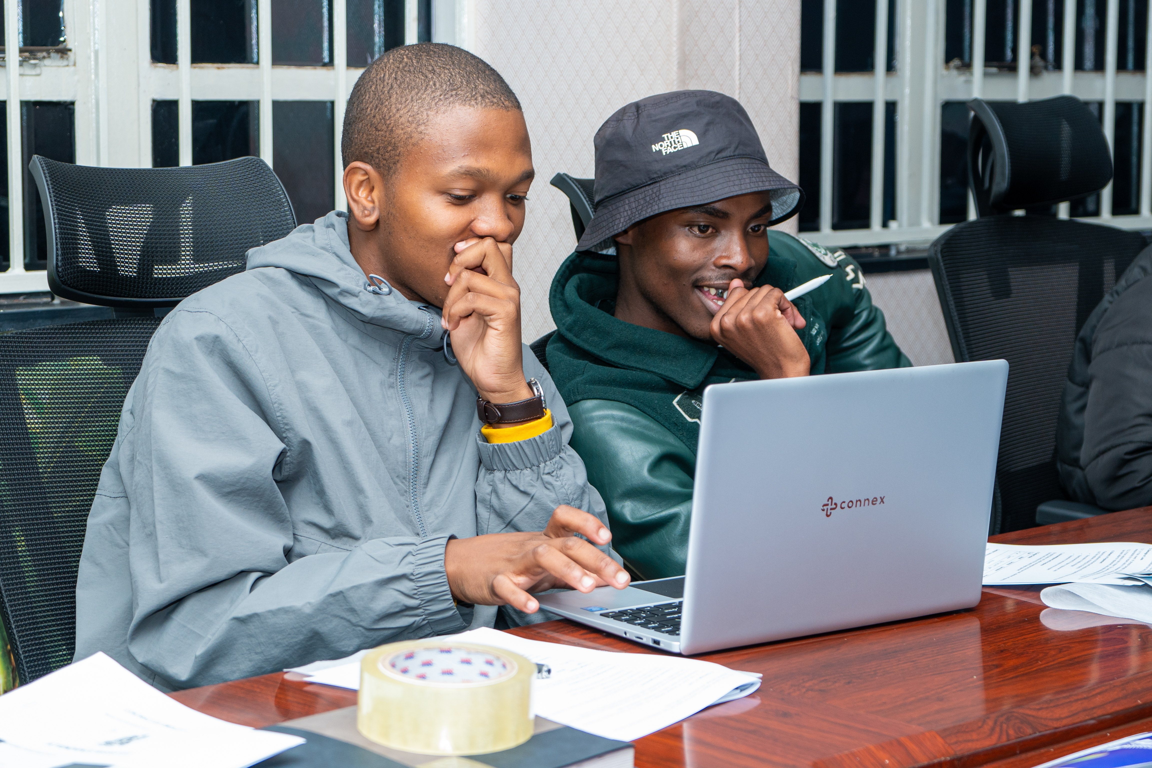 LEARNERS RECEIVING LAPTOPS