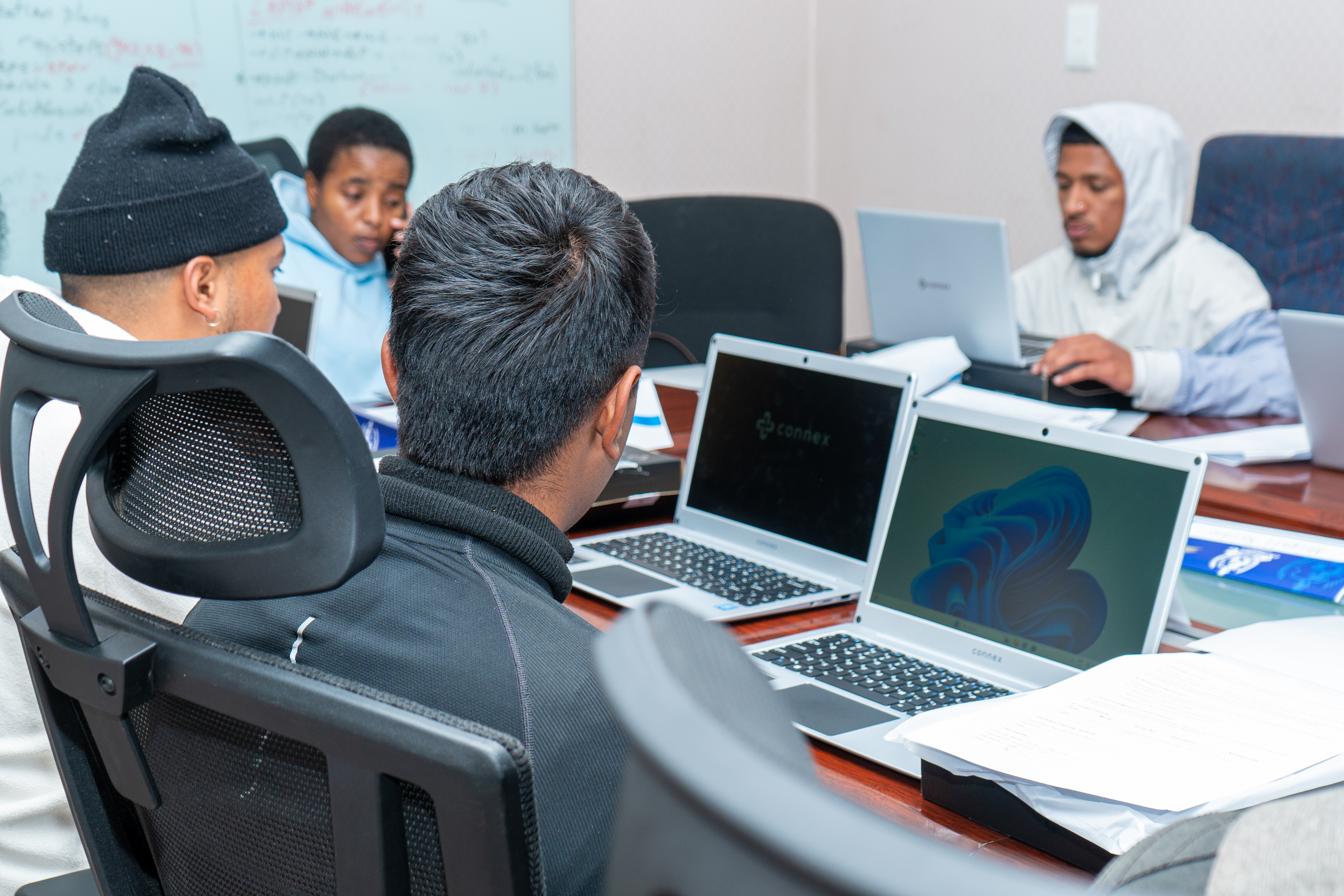 LEARNERS RECEIVING LAPTOPS