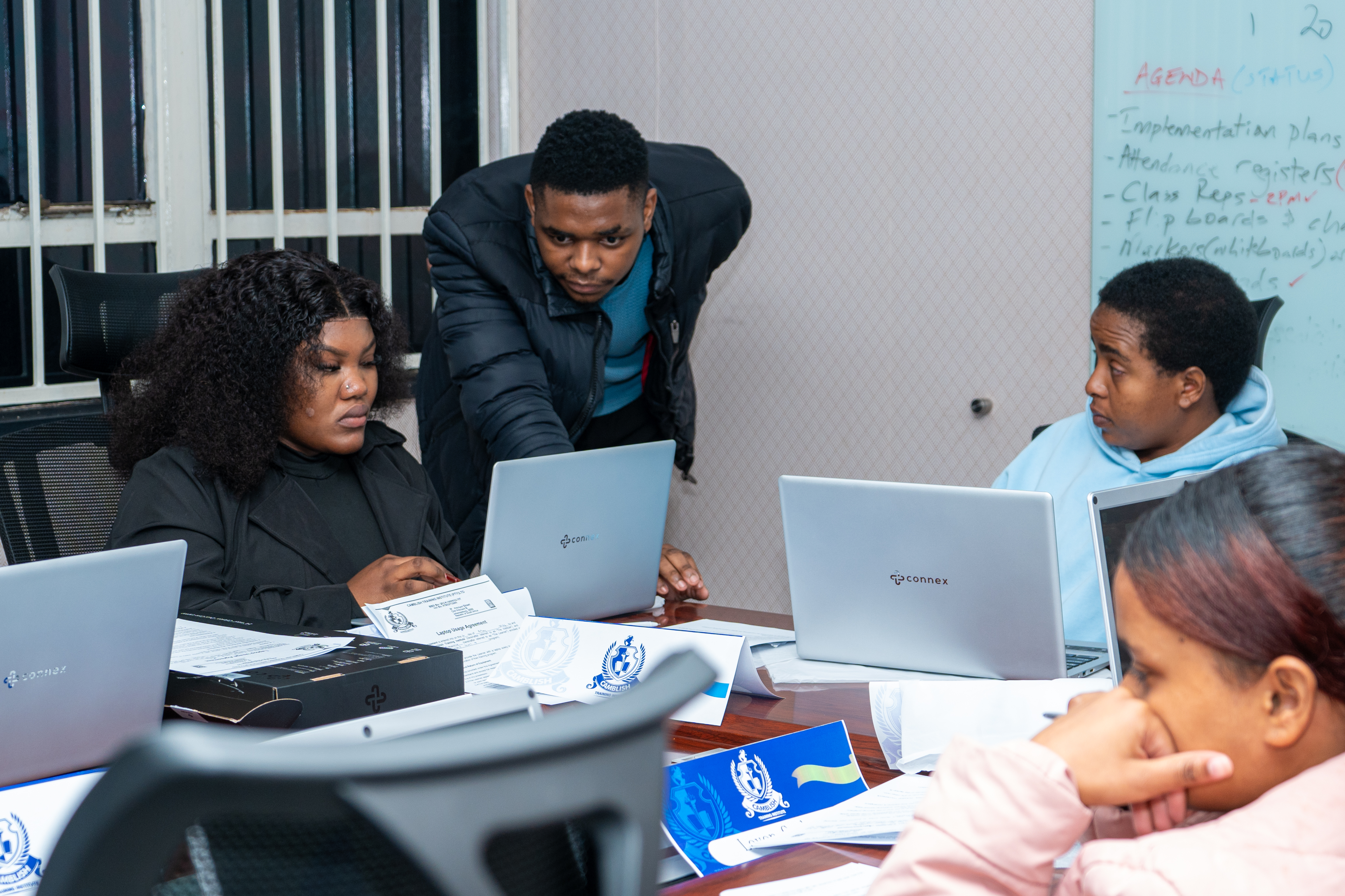 LEARNERS RECEIVING LAPTOPS